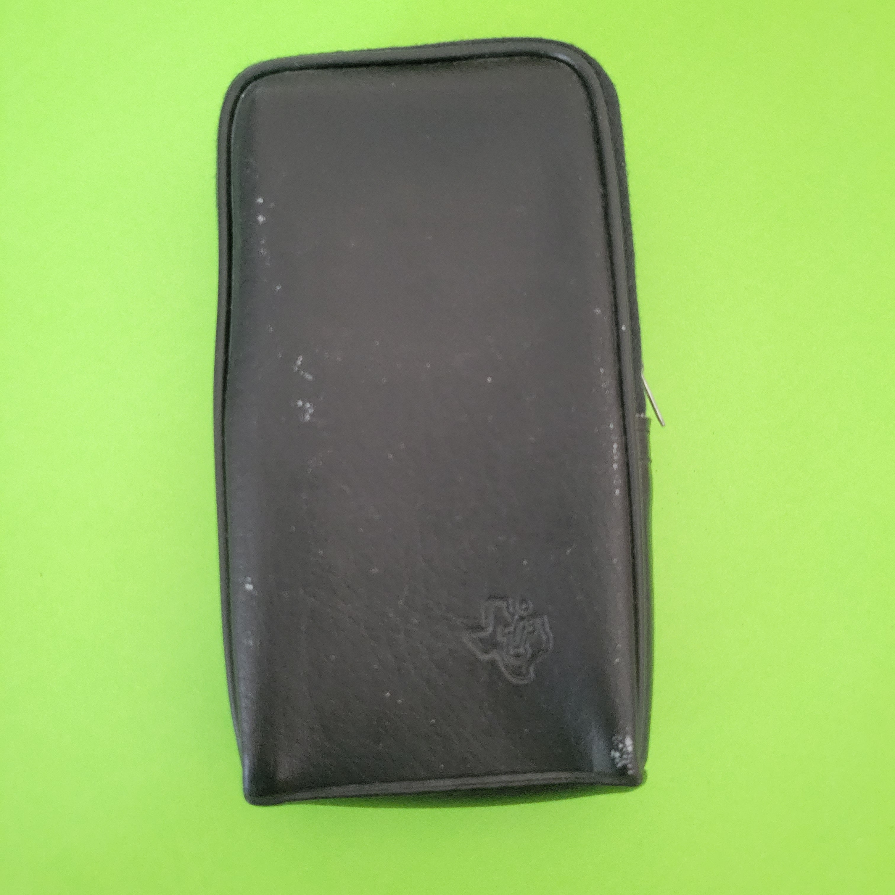 An image of the case of a texas instruments ti55 scientific/engineering calculator